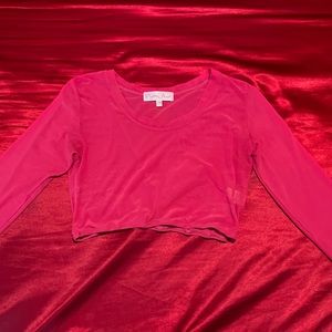 Two Pretty Angel see through, long sleeve crop tops.